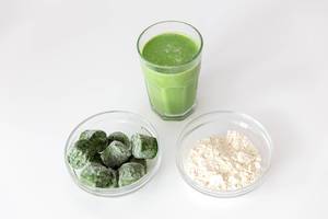 Frozen spinach and white almond powder: ingredients for a sugar free green protein drink for athletes