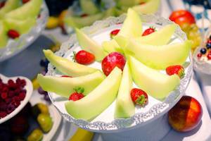 Fruit salad with melon and strawberries