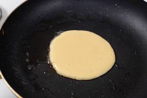 Frying American Pancake in the frying pan