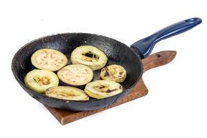 Frying Zucchini and Eggplant in the frying pan