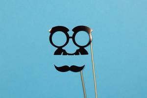 Funny mustache and glasses on sticks