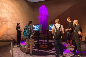 Gamescom visitors testing the adventure computer game of tv show  The Dark Crystal: Age of Resistance