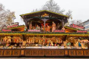 German Christmas market in Dortmund, with  with gingerbread hearts and festive, illuminated Christmas crib