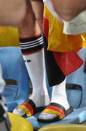 German football fan in sandals and white dfb socks