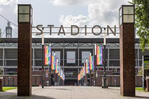 German soccer team and ice hockey club celebrate diversity day with gay activism flags at Rhein-Energie-Stadion in Cologne