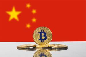 Golden Bitcoin and flag of China