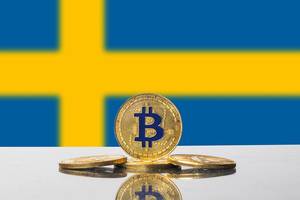 Golden Bitcoin and flag of Sweden