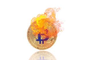 Golden Bitcoin in fire