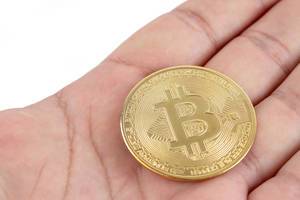 Golden Bitcoin in the hand