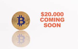 Goldene Bitcoinmünze mit dem Text "$20.000 Coming Soon"  (20.000 USD kommen bald)
