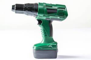 Green drill toy on white background