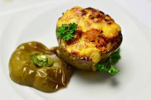 Green peppers stuffed with meat and cheese