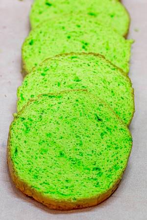 Green sliced sponge biscuit for cooking cake