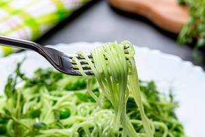 Green spaghetti with fork closeup (Flip 2019)