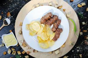 Grilled minced meat rolls with potatoes (Flip 2019)