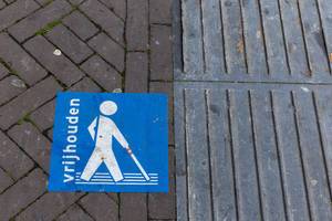 Guidelines for blind people on the sidewalk in Venlo, Netherlands