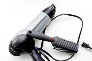 Hair Dryer and Brush on a White Background