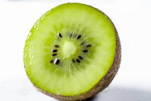 Half fresh kiwi close-up
