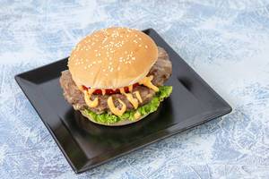Hamburger with Tomato Lettuce and Sauce on the square plate (Flip 2019) (Flip 2019)