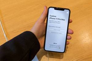 Hand holds a new iPhone 11 Pro Max