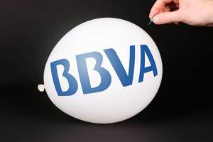 Hand uses a needle to burst a balloon with BBWA logo