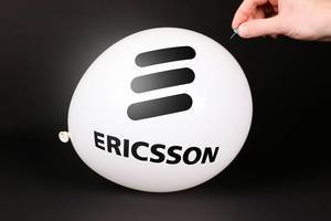 Hand uses a needle to burst a balloon with Ericsson logo