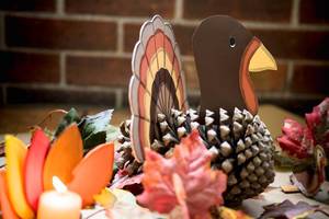 Handmade Thanksgiving decoration made from pine cones