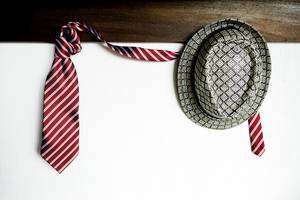 Hat and tie on shelf hangers