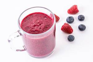 Healthy Blueberries and Raspberries juice in the glass (Flip 2019)