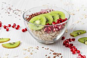 Healthy Breakfast background. Oatmeal with fruits and flax seeds (Flip 2019)