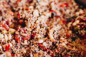 Healthy dish with quinoa, beans and vegetables. Close up