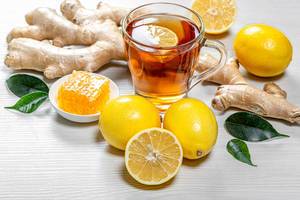 Healthy natural green tea with ginger root, honey and lemons