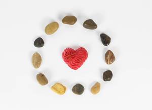 Heart surrounded by a circle of small stones