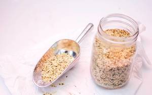 Hemp Seeds in a Spoon and Jar