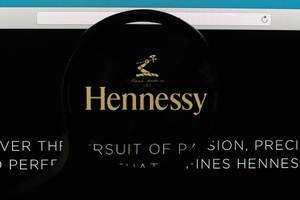Hennessy logo under magnifying glass