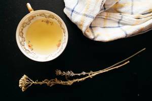 Herbal tea on dark background