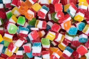 High Angle View of the Bulk of Colorful Gummy Jelly Candy Cubes