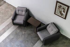High Angle View of the Two Armchairs at the Hallway