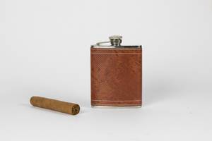 Hip flask and cigar