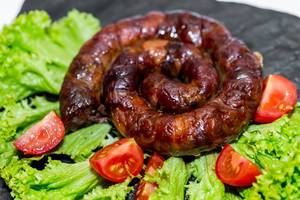 Home sausage with tomatoes and lettuce  Flip 2019