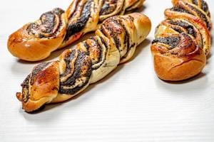 Homemade buns-pigtails with poppy seeds (Flip 2019)