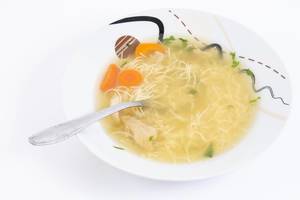Homemade domestic Chicken Soup with Carrots