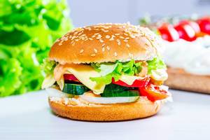 Homemade hamburger with lettuce and cheese (Flip 2019)