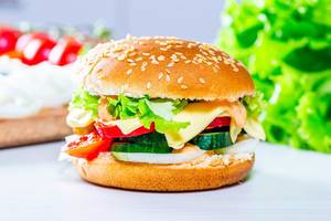 Homemade hamburger with lettuce and cheese