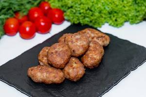 Homemade meat cutlets with vegetables and herbs  Flip 2019