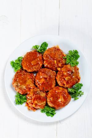Homemade Meatballs with Tomato Sauce and herbs