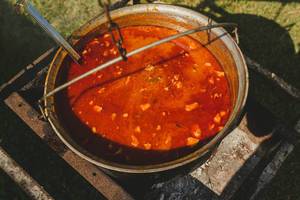 Hot Meat Tomatos Soup Made On Camp Fire