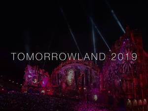 Illuminated main stage by night at open air electro festival Tomorrowland 2019