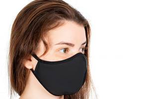 Infectious disease prevention concept, girl face in black medical mask