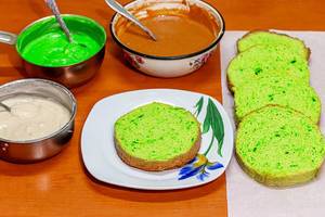 Ingredients for making homemade cake with green sponge cake, condensed milk and custards (Flip 2019)